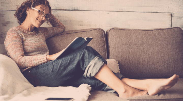 A woman reading a book.