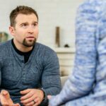 Canyon Vista - Myths and Misinformation About Recovery – Part Two. A man sits speaking with a figure in a blue shirt.