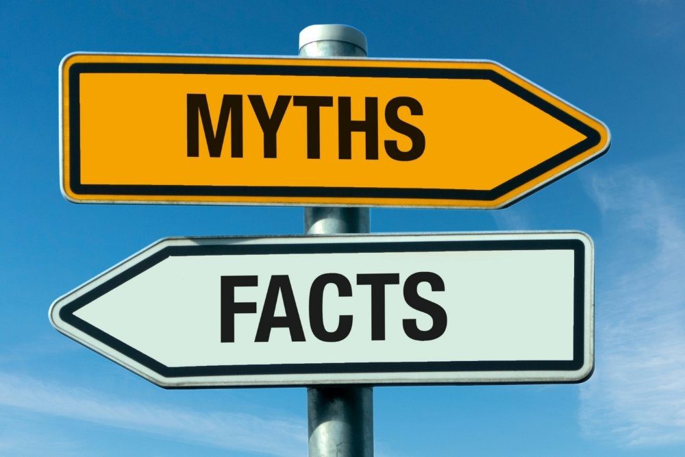 Canyon Vista - Myths and Misinformation About Recovery Part Three. A yellow sign with myths points to the right and a white sign with facts points to the left.